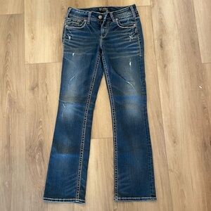 Silver Jeans Women's Distressed Blue Boot Cut Jeans